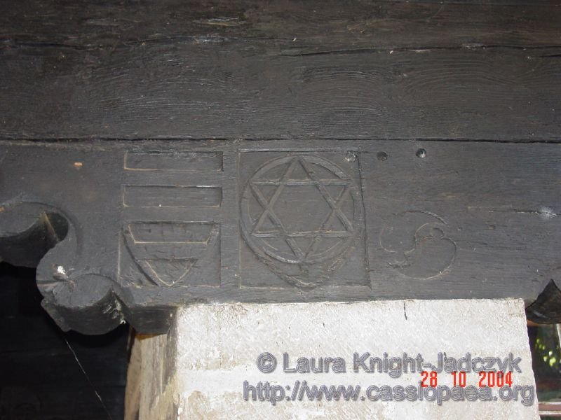 A closeup reveals one of the markings to be a Star of David, as it is now called.