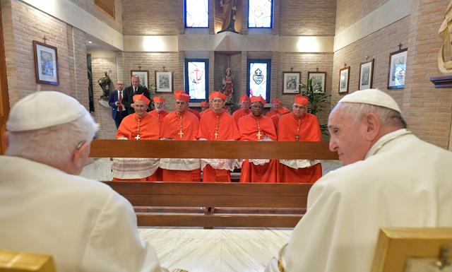 Pope Francis and 13 Roman Catholic prelates meet on a day of a ceremony to elevate them to the rank of cardinal, at Saint Peter's Basilica at the Vatican October 5, 2019. Vatican Media/Handout via REUTERS