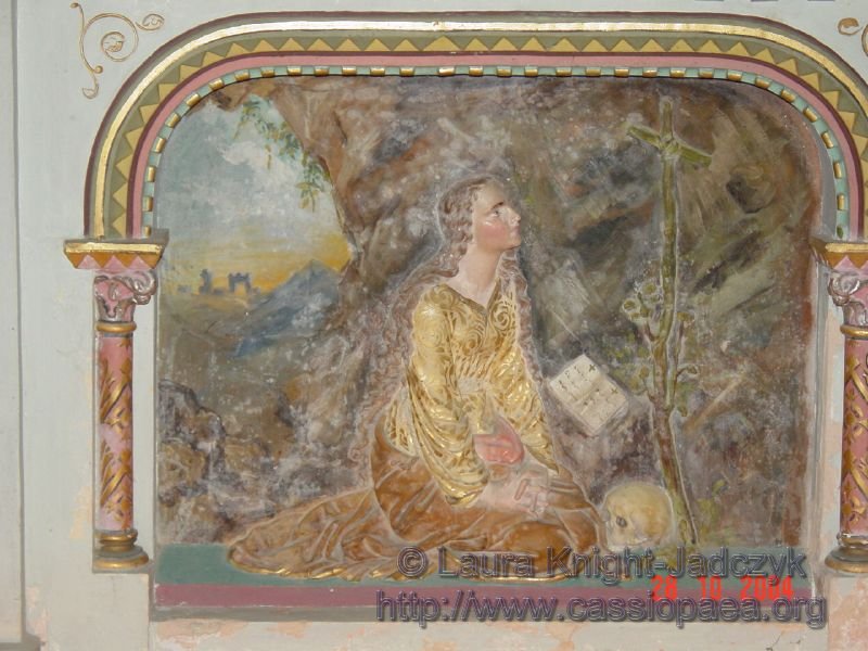 Much has been made of this piece, executed by Sauniere himself.  It appears to be in a grotto with a particular ruin in the background. The ruin itself reminds me very much of the cathedral in Alet-les-Bains.  What does strike me as unusual is the bit of pink in Mary's lap - a drape of fabric that looks amazingly like female genitalia.