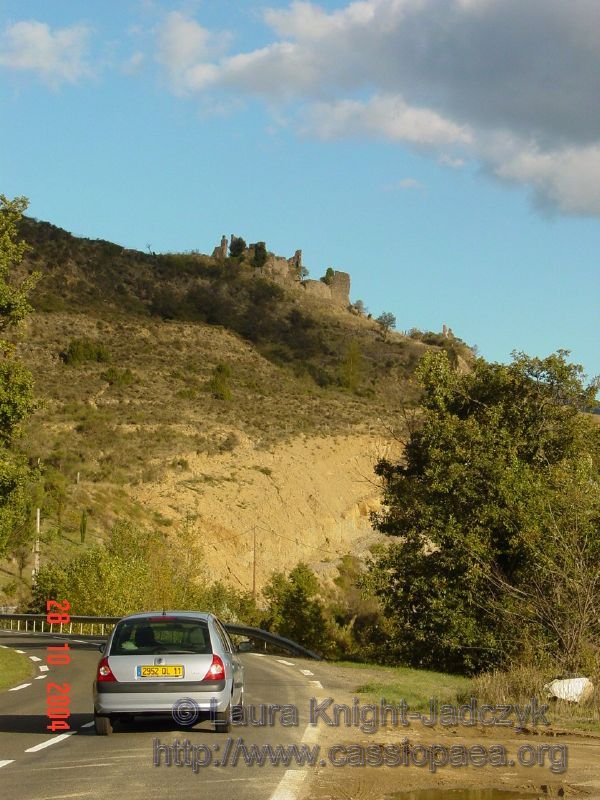 Driving along we see a ruined fortification on top of a hill ahead.