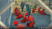 2013 - Gitmo prisoners forced to wear masks..2.PNG
