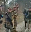 Ukrainian troops killing captured Russian soldiers.jpg