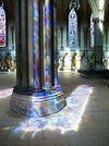 Sunlight through stained glass_ Lincoln Cathedral.jpg
