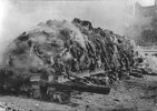 A pile of bodies awaits cremation after the bombing of Dresden, 1945 (1).JPG