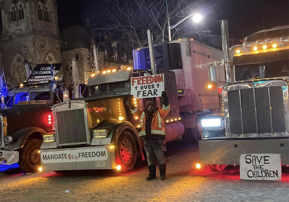 It is estimated that between 8,000 and 16,000 trucks could be forced off the road as a result of Ottawa's vaccine mandate affecting international truck traffic. | Screencap via Facebook/Freedom Convoy 2022