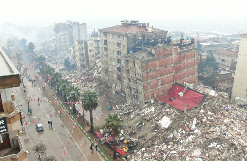  A general view shows damaged and collapsed buildings after an earthquake in Kahramanmaras, Turkey February 6, 2023 (credit: Ihlas News Agency (IHA) via REUTERS)