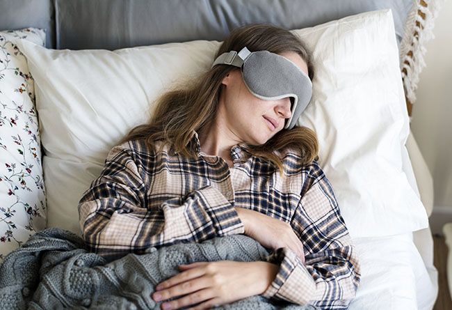 caucasian-woman-sleeping-in-bed_Small.jpg