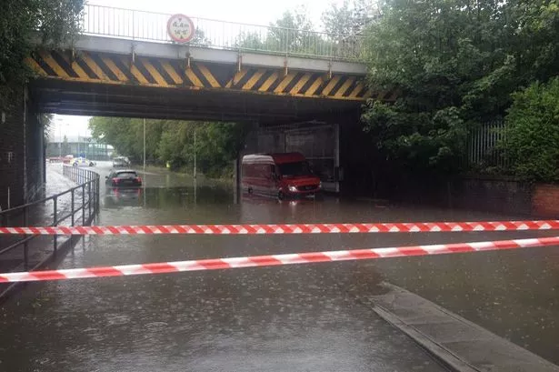 Huge-hole-opens-in-Mancunian-Way-after-flooding-causes-major-disruption.jpg