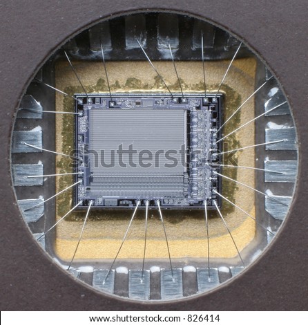 stock-photo-microchip-close-up-and-personal-as-it-were-this-is-an-obsolete-k-eprom-the-manufacturers-id-826414.jpg