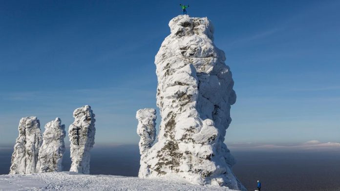 Manpupuner rock formations are set of 7 huge stone pillars situated on a flat plateau, west of the Ural Mountains in the Troitsko-Pechorsky