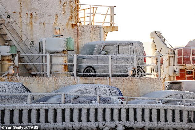 A view of the ice-covered cars and railings on board the Sun Rio cargo ship. Some were clad in ice up to six inches thick, said local media reports