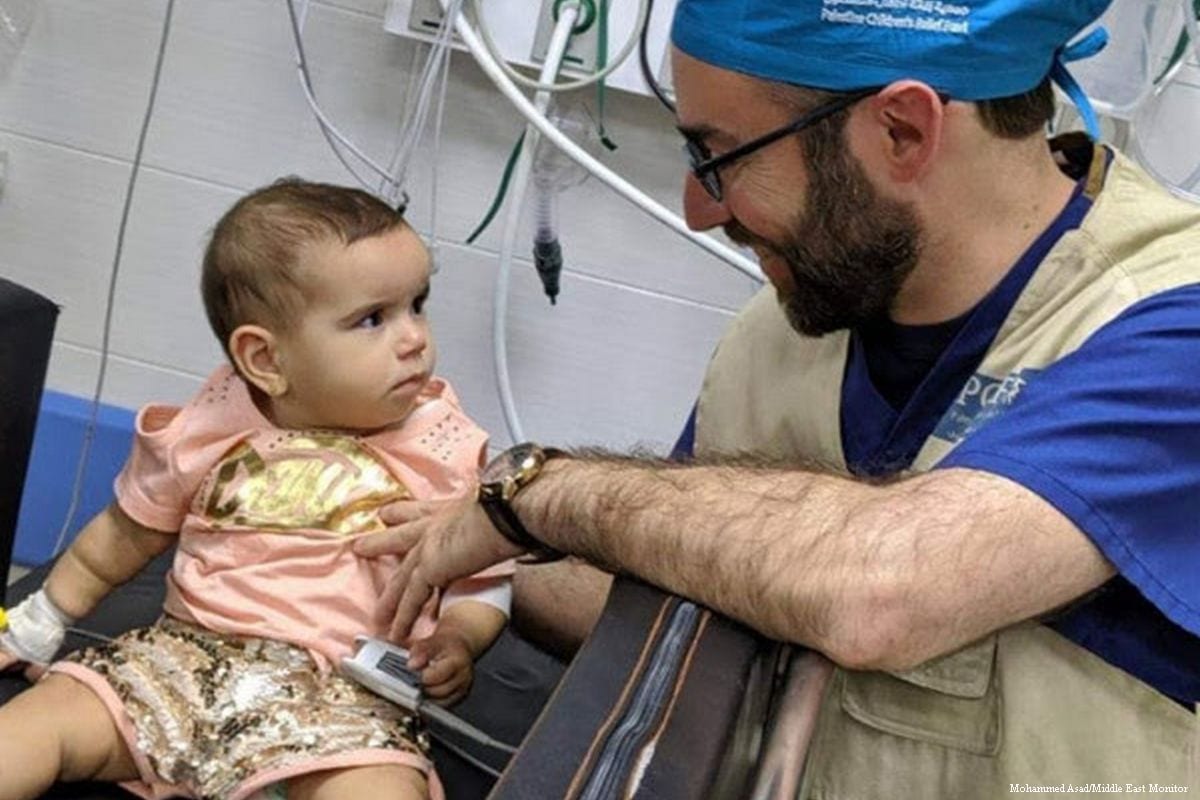 A doctor belonging to the American medical team that succeeded in removing a bullet from head of 7-month-old Palestinian infant who was shot by Israeli fire while in the lap of her mother
