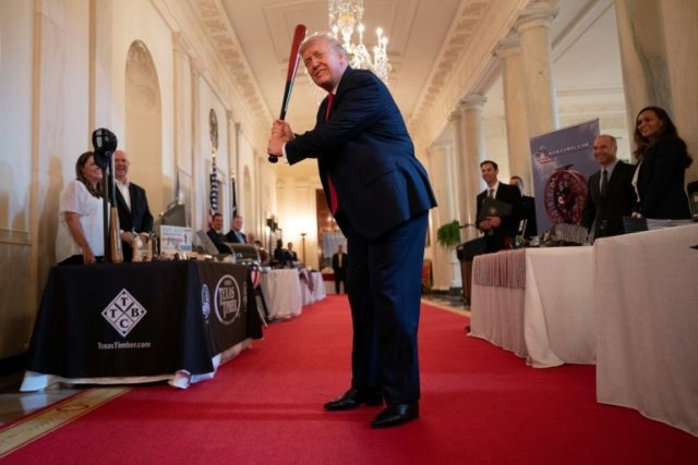 Trump's White House moves Bush, Clinton portraits to disused room