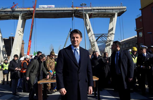 Italy's Prime Minister Giuseppe Conte arrives to visit the collapsed Morandi Bridge in Genoa, Italy, February 8, 2019.  REUTERS/Massimo Pinca