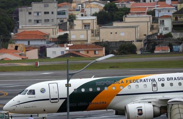 The presidential airplane transporting Brazil's President Jair Bolsonaro is seen before taking off at the Congonhas airport after leaving the Albert Einstein Hospital in Sao Paulo, Brazil February 13, 2019. REUTERS/Nacho Doce
