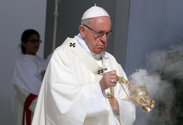 FILE PHOTO - Pope Francis holds a mass at Zayed Sports City Stadium in Abu Dhabi, United Arab Emirates, February 5, 2019. REUTERS/Tony Gentile