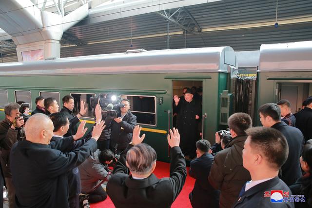 North Korean leader Kim Jong Un waves from a train in Beijing, China, in this photo released by North Korea's Korean Central News Agency (KCNA) on January 10, 2019. KCNA via REUTERS  