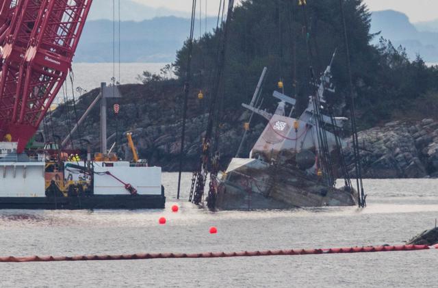 The shipwrecked Norwegian frigate "KNM Helge Ingstad" is seen during a salvage operation near Bergen, Norway February 26, 2019.  Vidar Ruud/NTB Scanpix/via REUTERS 