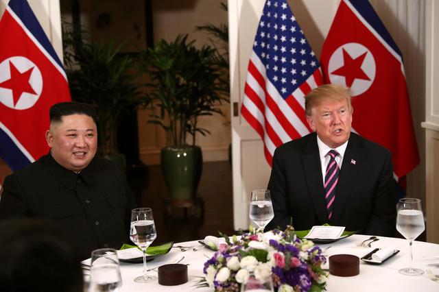 U.S. President Donald Trump and North Korean leader Kim Jong Un sit down for a dinner during the second U.S.-North Korea summit at the Metropole Hotel in Hanoi, Vietnam February 27, 2019. REUTERS/Leah Millis