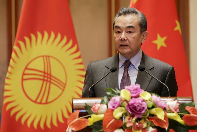 FILE PHOTO: Chinese Foreign Minister Wang Yi attends a joint news conference with Kyrgyzstan's Foreign Minister Chyngyz Aidarbekov (not pictured) at the Diaoyutai State Guesthouse in Beijing, China, February 21, 2019. REUTERS/Jason Lee