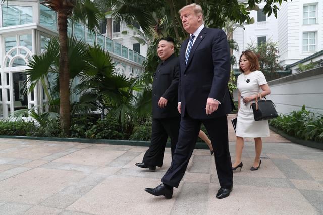 North Korea's leader Kim Jong Un and U.S. President Donald Trump walk at the Metropole hotel during the second North Korea-U.S. summit in Hanoi, Vietnam February 28, 2019. REUTERS/Leah Millis