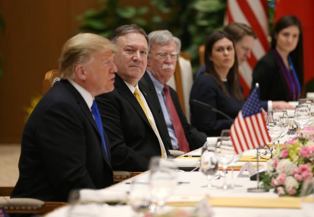 U.S. Secretary of State Mike Pompeo (2nd L) attends a working lunch alongside President Donald Trump (L) during a meeting with Vietnamese Prime Minister Nguyen Xuan Phuc (unseen) at the Office of Government Hall in Hanoi, Vietnam, February 27, 2019. REUTERS/Leah Millis