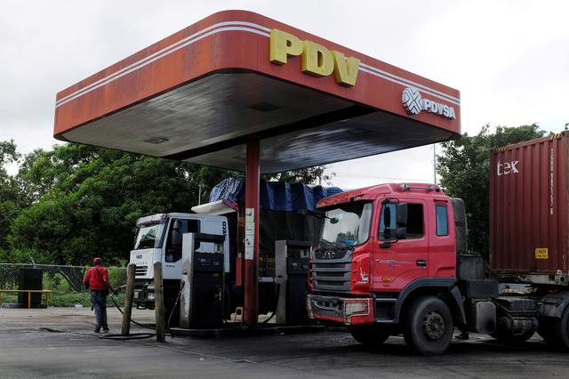 FILE PHOTO: The corporate logo of Venezuelan state-owned oil company PDVSA is seen at a gas station in Cupira, Venezuela December 16, 2018. REUTERS/Marco Bello/File Photo