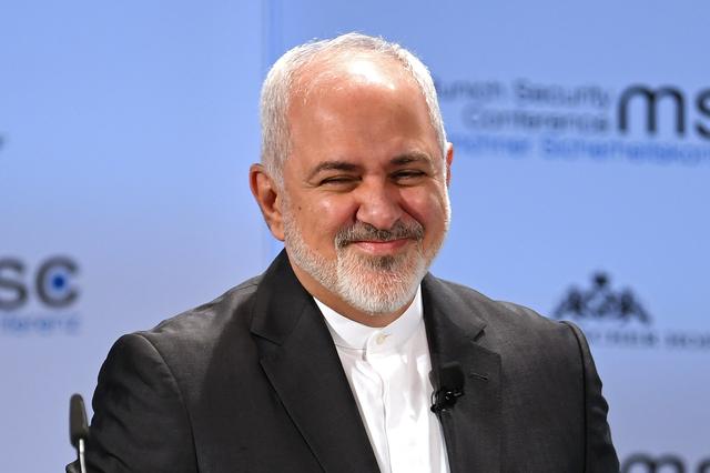 FILE PHOTO: Iran's Foreign Minister Mohammad Javad Zarif smiles during the annual Munich Security Conference in Munich, Germany February 17, 2019. REUTERS/Andreas Gebert/File Photo