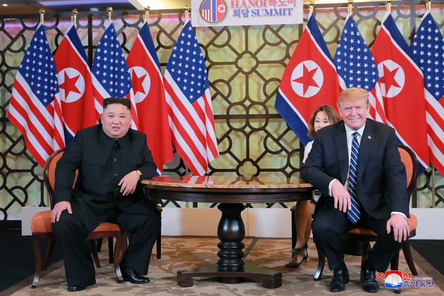 FILE PHOTO -  North Korea's leader Kim Jong Un and U.S. President Donald Trump meet for the second North Korea-U.S. summit in Hanoi, Vietnam, in this photo released on March 1, 2019 by North Korea's Korean Central News Agency (KCNA).  KCNA via REUTERS    