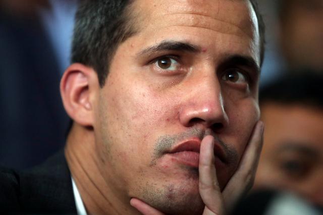 Venezuelan opposition leader Juan Guaido, who many nations have recognized as the country's rightful interim ruler, looks on during a press conference after the meeting with public employees in Caracas, Venezuela March 5, 2019. REUTERS/Ivan Alvarado