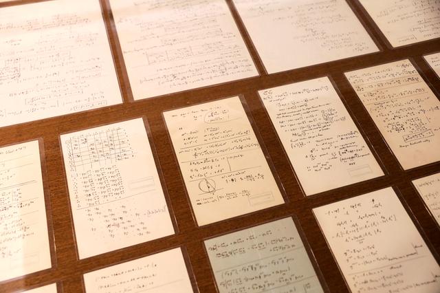 Part of a collection of 110 manuscript pages written by Albert Einstein that were unveiled by Israel's Hebrew University are seen on display at the university in Jerusalem March 6, 2019. REUTERS/Ronen Zvulun