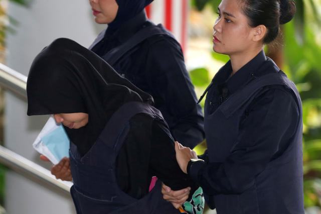 Indonesian Siti Aisyah, who is on trial for the killing of Kim Jong Nam, the estranged half-brother of North Korea's leader, arrives at the Shah Alam High Court on the outskirts of Kuala Lumpur, Malaysia March 11, 2019. REUTERS/Lai Seng Sin     TPX IMAGES OF THE DAY