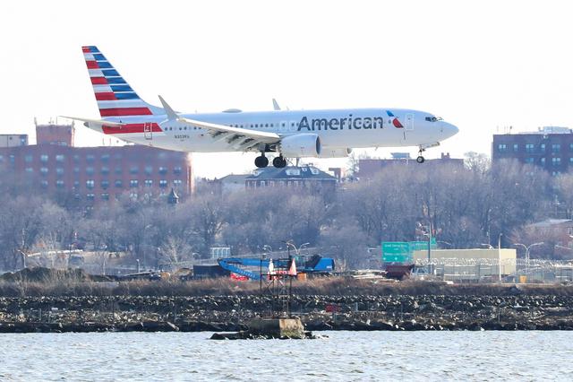 An American Airlines Boeing 737 Max 8, on a flight from Miami to New York City, comes in for landing at LaGuardia Airport in New York, U.S., March 12, 2019. REUTERS/Shannon Stapleton     