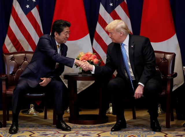 FILE PHOTO: U.S. President Donald Trump and Japan's Prime Minister Shinzo Abe hold a bilateral meeting on the sidelines of the 73rd session of the United Nations General Assembly in New York, U.S., September 26, 2018. REUTERS/Carlos Barria