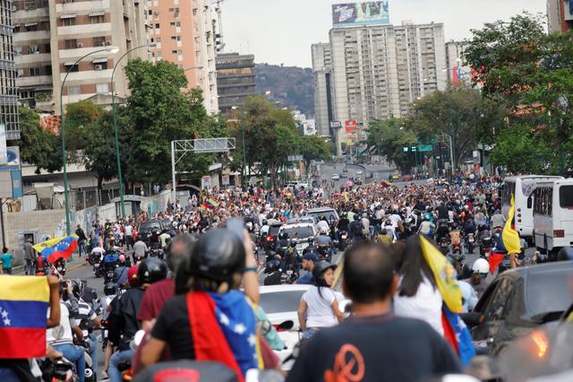 People throng the streets to protest against Venezuelan President Nicolas Maduro's government in Caracas, Venezuela, March 12, 2019. REUTERS/Carlos Jasso