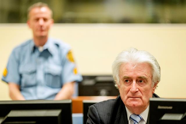 FILE PHOTO: Ex-Bosnian Serb leader Radovan Karadzic sits in the court of the International Criminal Tribunal for former Yugoslavia (ICTY) in The Hague, the Netherlands March 24, 2016. REUTERS/Robin van Lonkhuijsen/Pool/File Photo