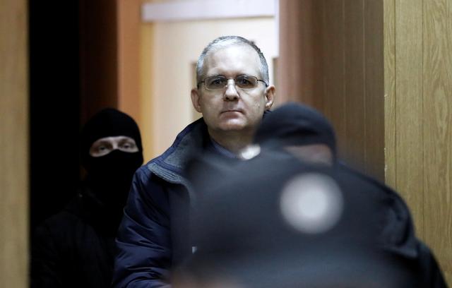 FILE PHOTO: Former U.S. marine Paul Whelan who is being held on suspicion of spying, is escorted out of a courtroom after a ruling regarding extension of his detention, in Moscow, Russia, February 22, 2019.  REUTERS/Shamil Zhumatov