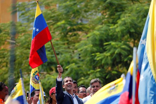 Venezuelan opposition leader Juan Guaido, who many nations have recognised as the country's rightful interim ruler, takes part in a rally against Venezuelan President Nicolas Maduro's government, in Guacara, Venezuela March 16, 2019. REUTERS/Carlos Jasso