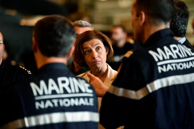FILE PHOTO -  French Defence Minister Florence Parly stands with marine officers as she visits the aircraft carrier Charles de Gaulle, on the occasion of the completion of its 18 month-long renovation in Toulon, France, November 8, 2018. Christophe Simon/Pool via REUTERS