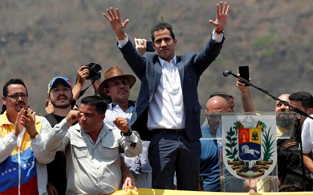 FILE PHOTO: Venezuelan opposition leader Juan Guaido, who many nations have recognised as the country's rightful interim ruler, takes part in a rally against President Nicolas Maduro's government in Valencia, Venezuela, March 16, 2019. REUTERS/Carlos Jasso/File Photo