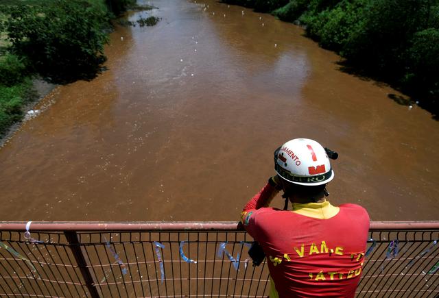 FILE PHOTO: A rescue worker reacts during a demonstration in honor of victims of the collapse of a dam owned by Brazilian mining company Vale SA, in Brumadinho, Brazil February 25, 2019. REUTERS/Washington Alves/File Photo