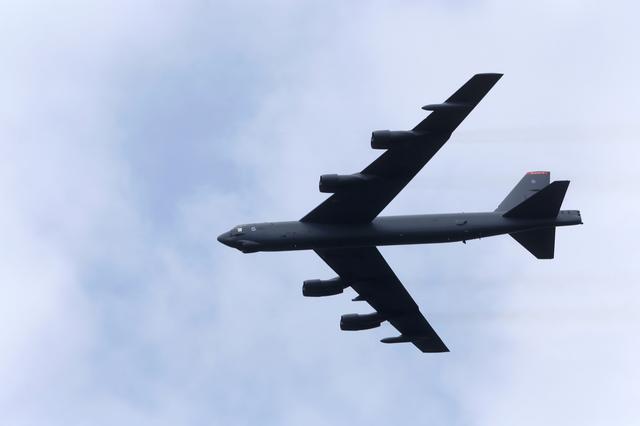 FILE PHOTO: U.S. bomber B-52 flies over during the final day of NATO Saber Strike exercises in Orzysz, Poland, June 16, 2017. REUTERS/Ints Kalnins