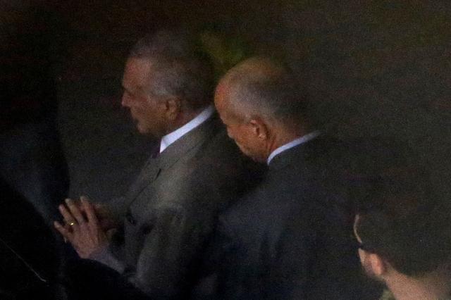 Brazil's former president Michel Temer (L) is seen at Guarulhos airport in Sao Paulo, Brazil March 21, 2019 REUTERS/Amanda Perobelli