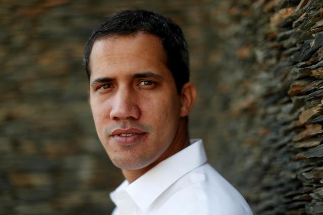 Venezuelan opposition leader Juan Guaido, who many nations have recognized as the country's rightful interim ruler, poses for a photograph after an interview with Reuters in Caracas, Venezuela March 22, 2019. REUTERS/Carlos Jasso