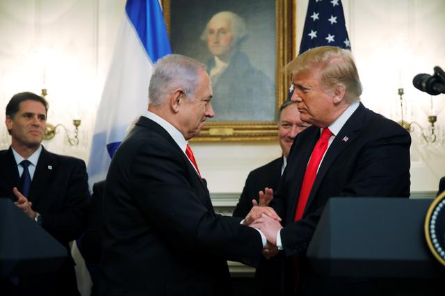 U.S. President Donald Trump shakes hands with Israel's Prime Minister Benjamin Netanyahu as they deliver statements at the White House in Washington, U.S., March 25, 2019. REUTERS/Carlos Barria