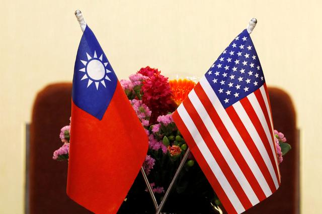FILE PHOTO: Flags of Taiwan and U.S. are placed for a meeting between U.S. House Foreign Affairs Committee Chairman Ed Royce speaks and with Su Chia-chyuan, President of the Legislative Yuan in Taipei, Taiwan March 27, 2018. REUTERS/Tyrone Siu/File Photo