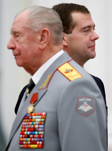 FILE PHOTO: Russia's President Dmitry Medvedev (back) is seen with former Soviet Defence Minister Marshal Dmitry Yazov after decorating him with the Service to the Fatherland order of the fourth grade during an award ceremony in Moscow's Kremlin, November 2, 2009.  REUTERS/Ivan Sekretarev/Pool/File Photo