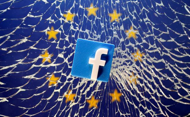 FILE PHOTO: A 3D printed Facebook logo is placed on broken glass above a printed EU flag in this illustration taken January 28, 2019. REUTERS/Dado Ruvic/Illustration/File Photo