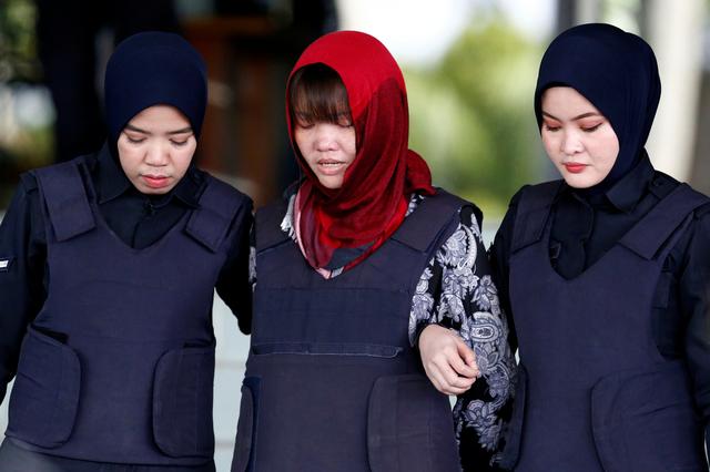 FILE PHOTO - Vietnamese Doan Thi Huong, who was a suspect in the murder case of North Korean leader's half brother Kim Jong Nam, leaves the Shah Alam High Court on the outskirts of Kuala Lumpur, Malaysia March 14, 2019. REUTERS/Lai Seng Sin
