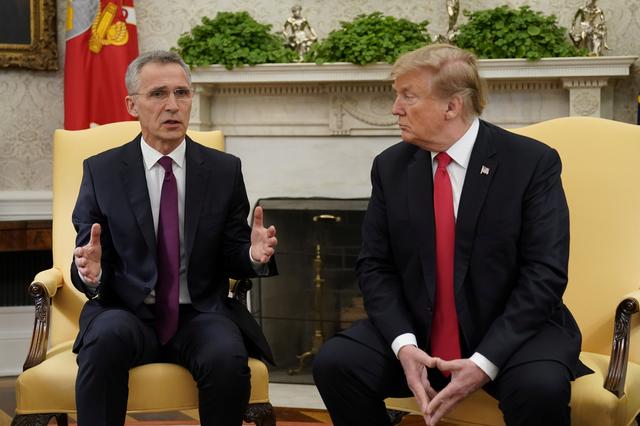U.S. President Donald Trump listens to NATO Secretary General Jens Stoltenberg while meeting in the Oval Office at the White House in Washington, U.S., April 2, 2019. REUTERS/Joshua Roberts